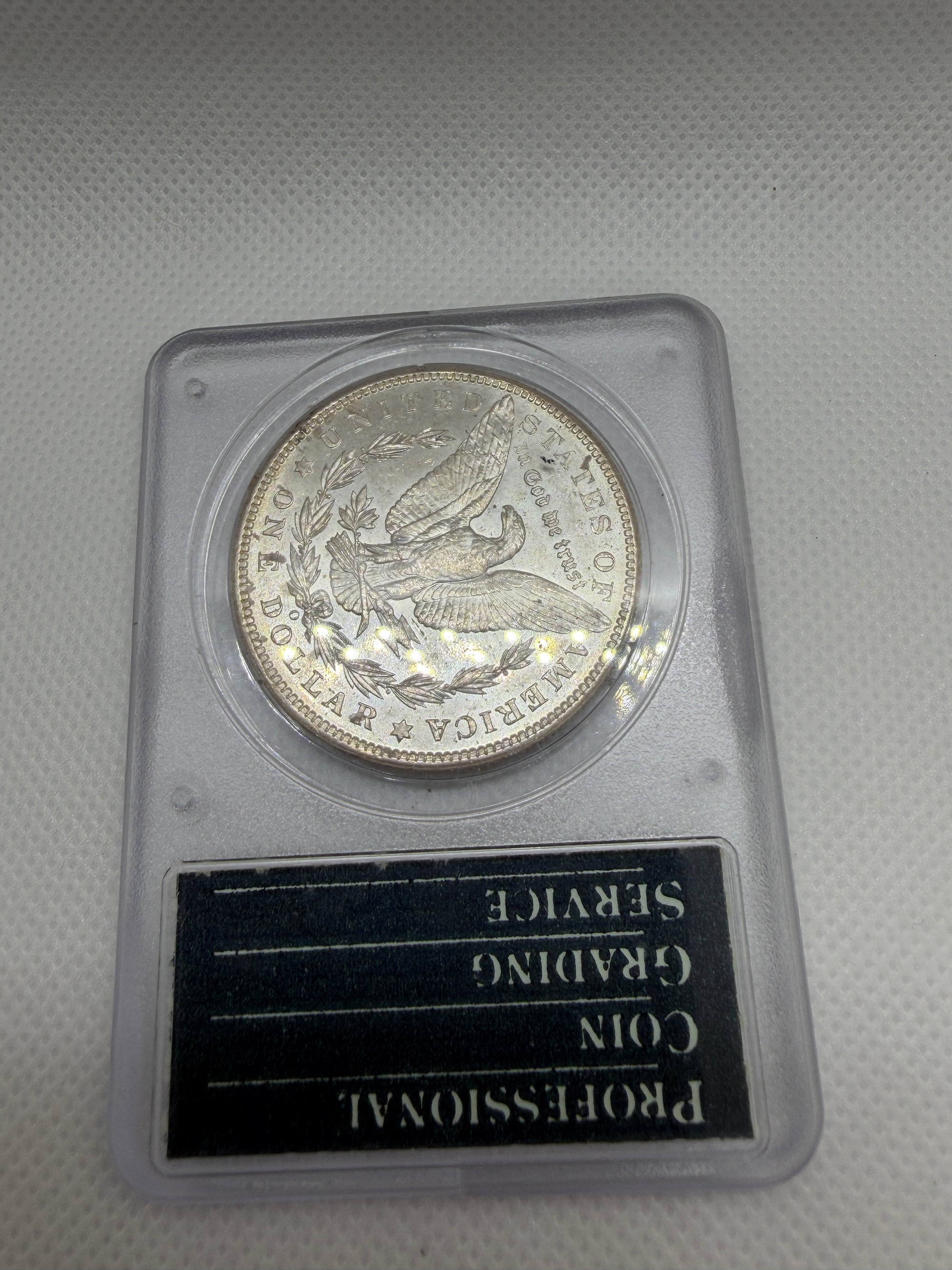 1904 O Morgan Silver Dollar – PCGS MS63 | Old Rattler Holder