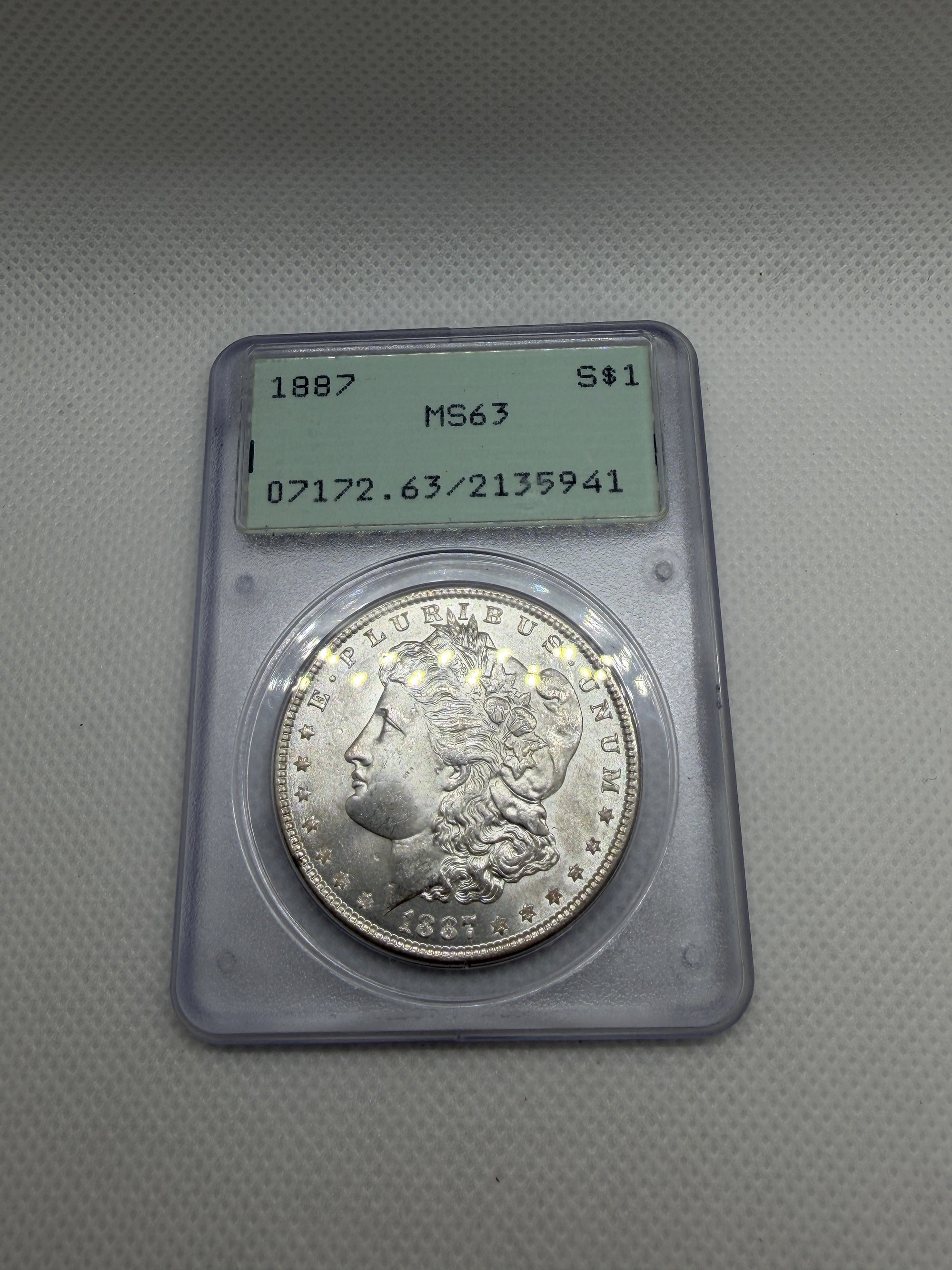 1887 Morgan Silver Dollar – PCGS MS63 | Old Rattler Holder