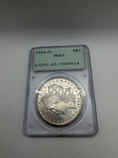 1904 O Morgan Silver Dollar – PCGS MS63 | Old Rattler Holder