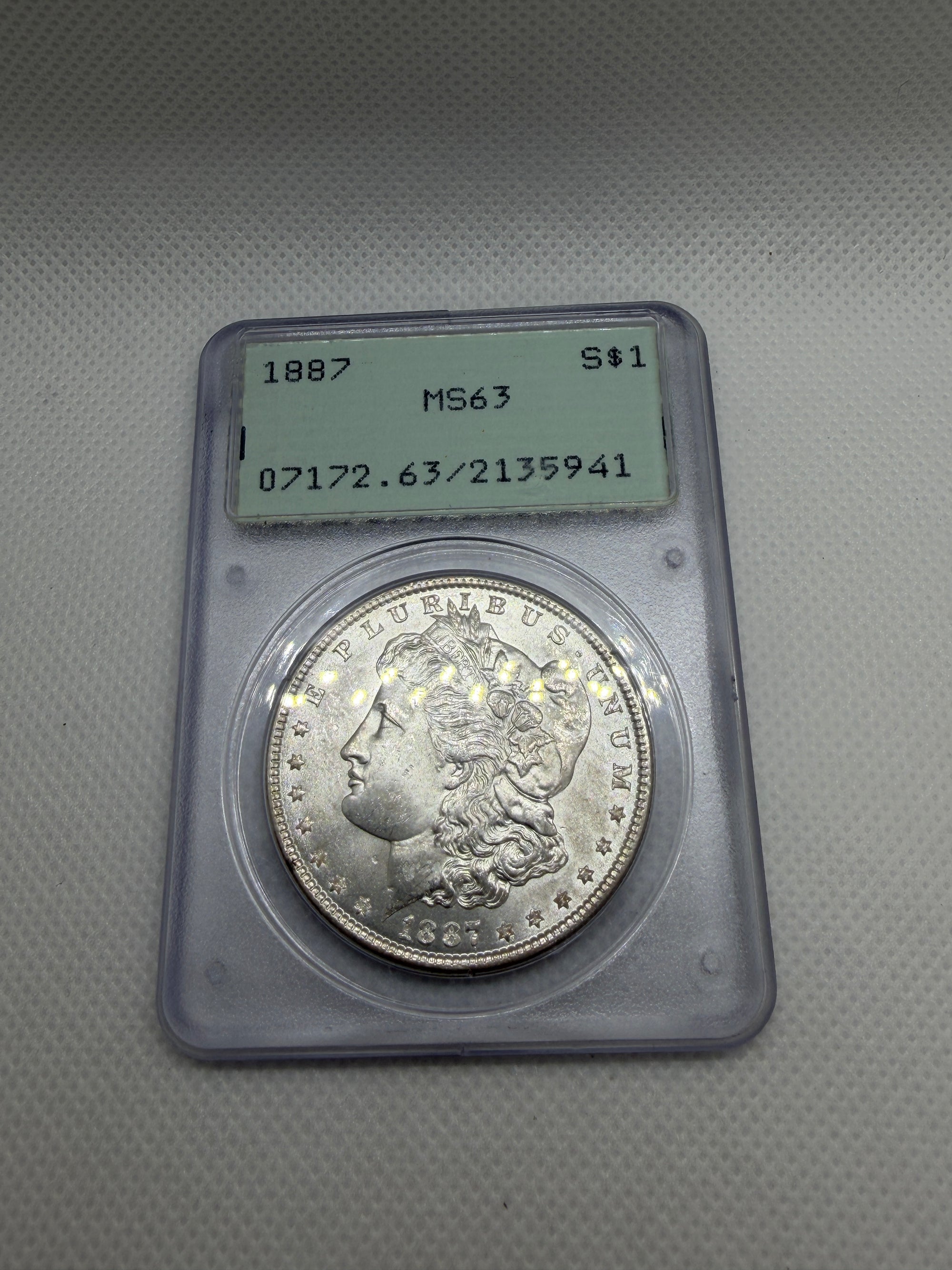 1887 Morgan Silver Dollar – PCGS MS63 | Old Rattler Holder