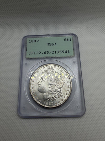 1887 Morgan Silver Dollar – PCGS MS63 | Old Rattler Holder