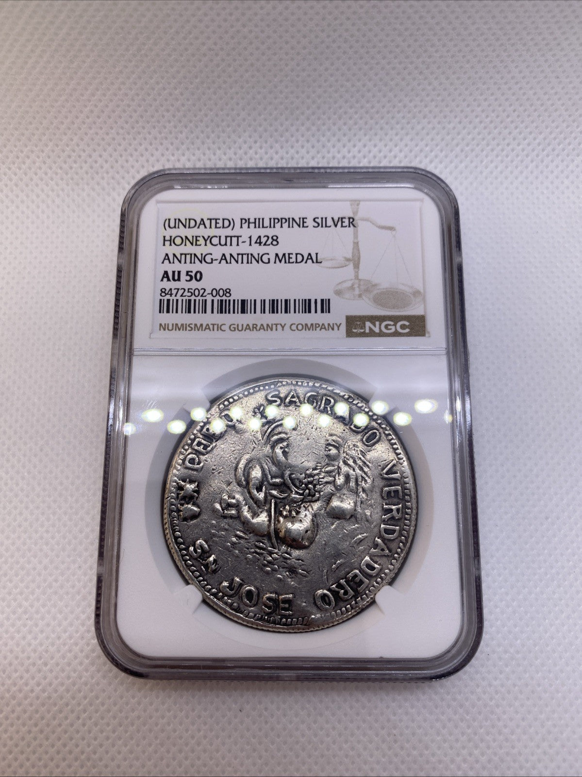Philipines Honeycutt - 1428 Anting-Anting Silver Medal Graded NGC AU50 RARE