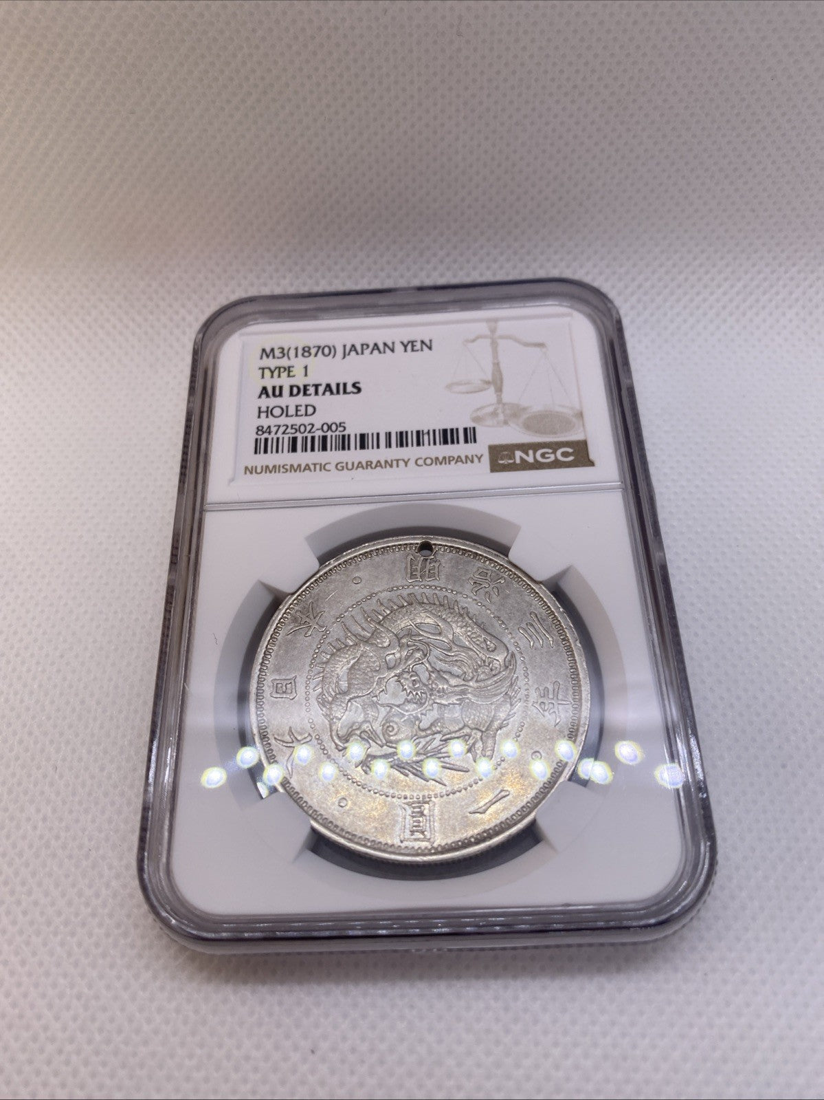 M3 1870 Japan Yen Type 1 NGC AU Det Holed Silver Coin Graded By NGC #502-005