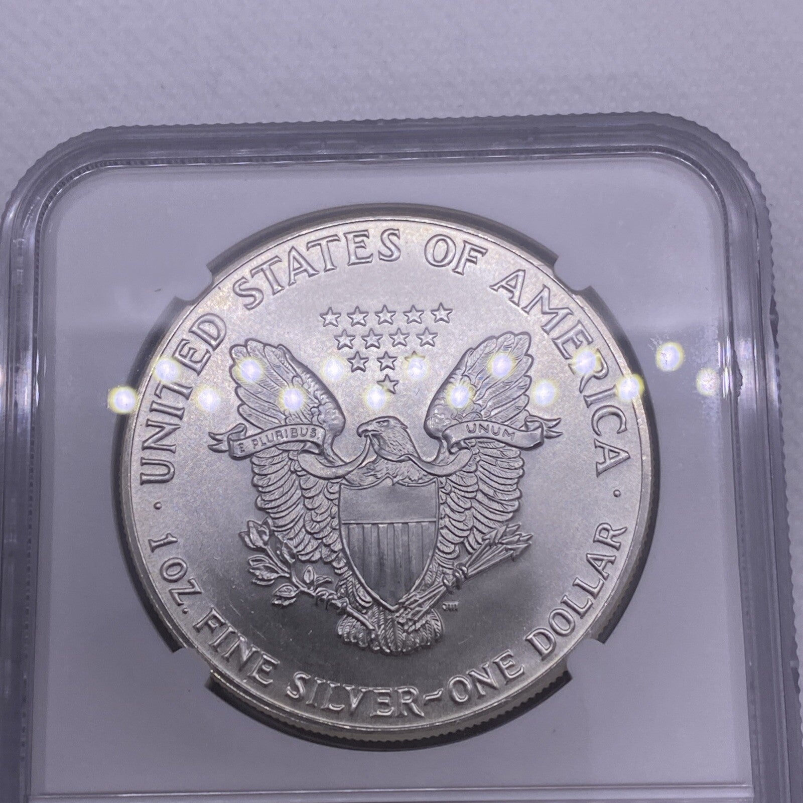 1986 $1 AMERICAN SILVER EAGLE NGC MS68 OBVERSE & REVERSE STRUCK THRU MINT ERROR