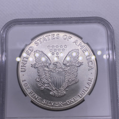 1986 $1 AMERICAN SILVER EAGLE NGC MS68 OBVERSE & REVERSE STRUCK THRU MINT ERROR