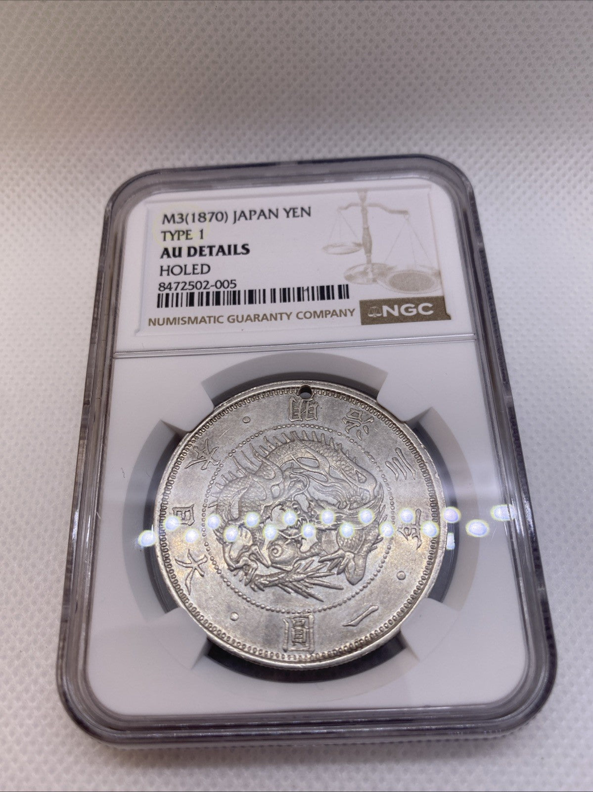 M3 1870 Japan Yen Type 1 NGC AU Det Holed Silver Coin Graded By NGC #502-005