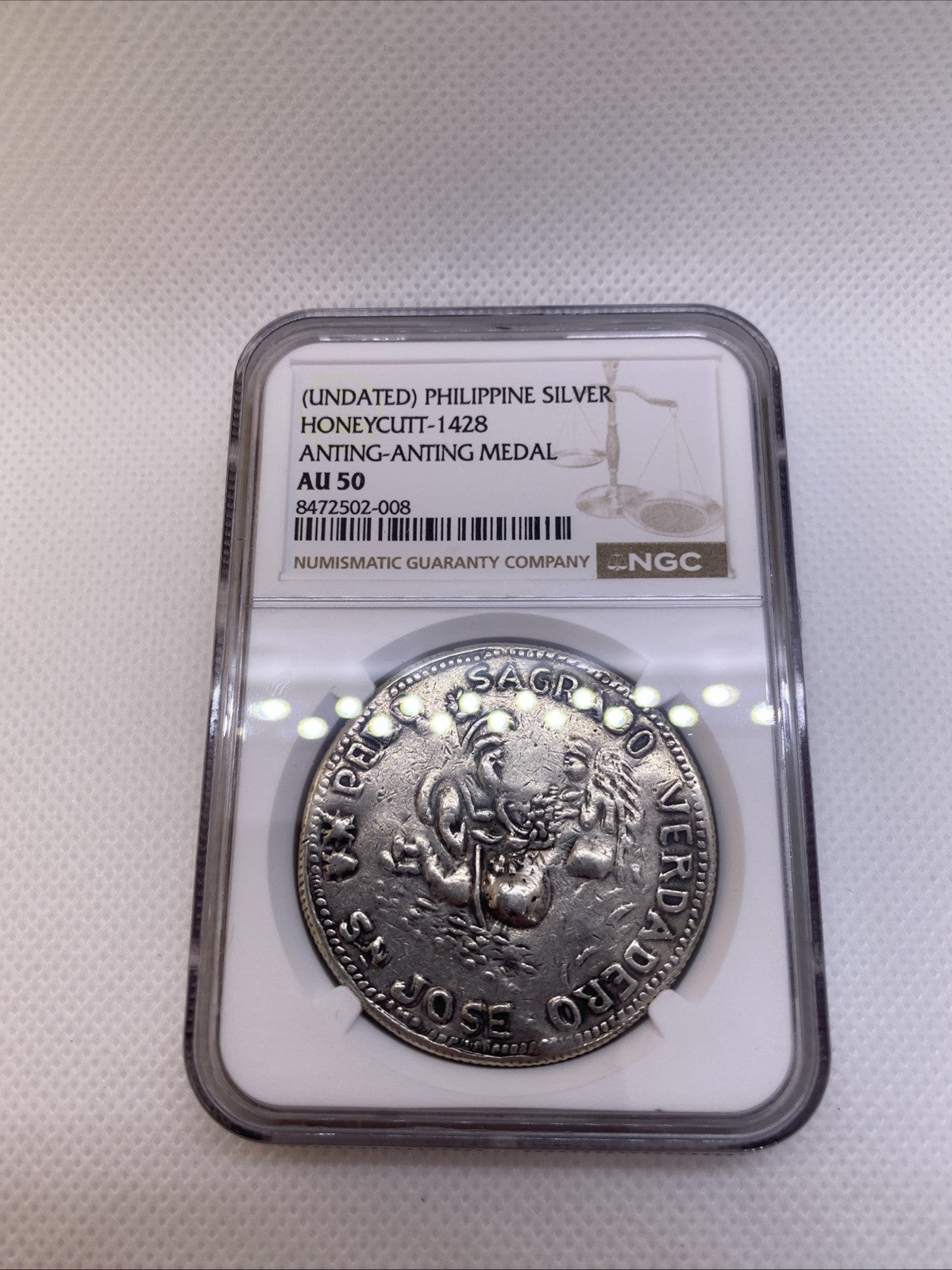 Philipines Honeycutt - 1428 Anting-Anting Silver Medal Graded NGC AU50 RARE