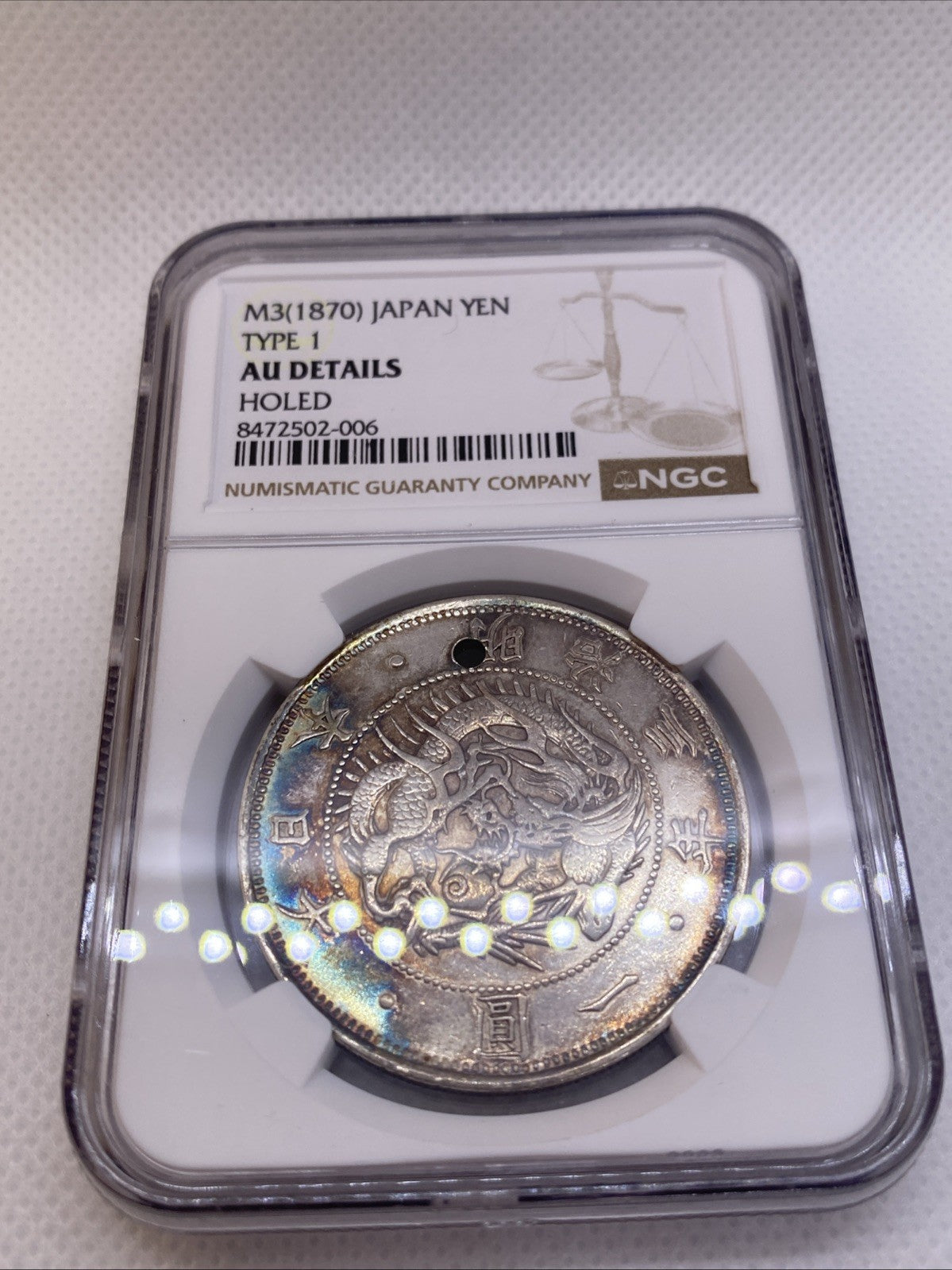 M3 1870 Japan Yen Type 1 NGC AU Det Hole Silver Coin Graded By NGC #502-006