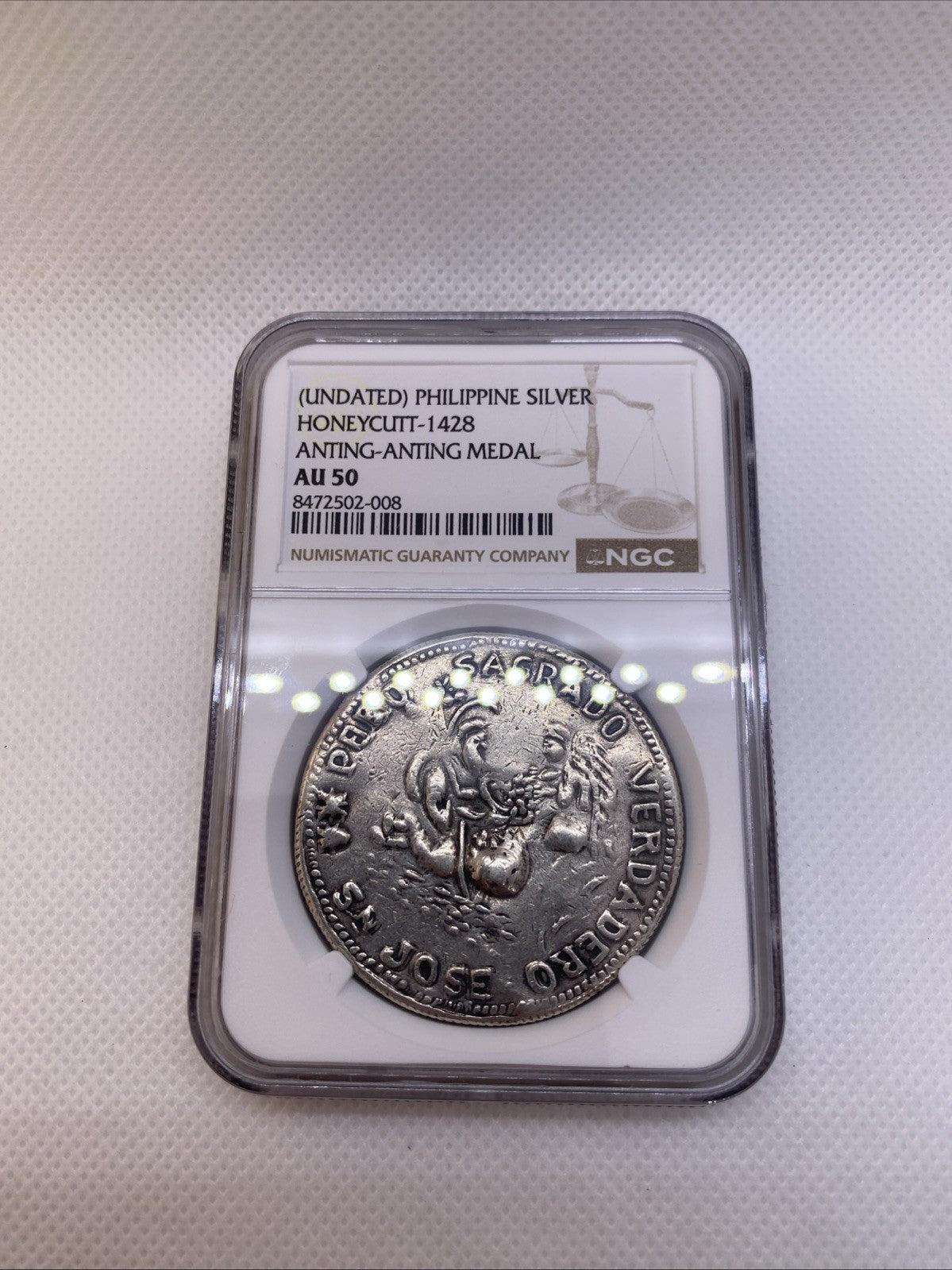 Philipines Honeycutt - 1428 Anting-Anting Silver Medal Graded NGC AU50 RARE