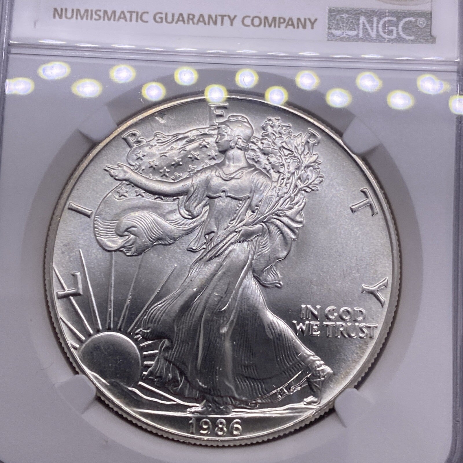 1986 $1 AMERICAN SILVER EAGLE NGC MS68 OBVERSE & REVERSE STRUCK THRU MINT ERROR