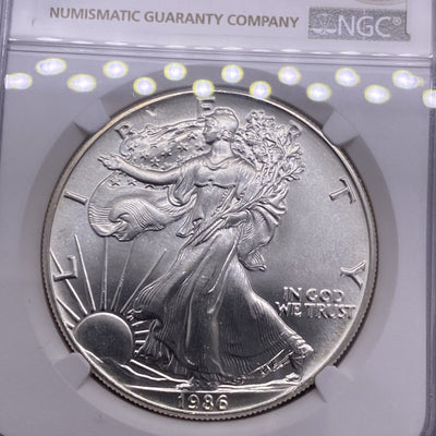 1986 $1 AMERICAN SILVER EAGLE NGC MS68 OBVERSE & REVERSE STRUCK THRU MINT ERROR