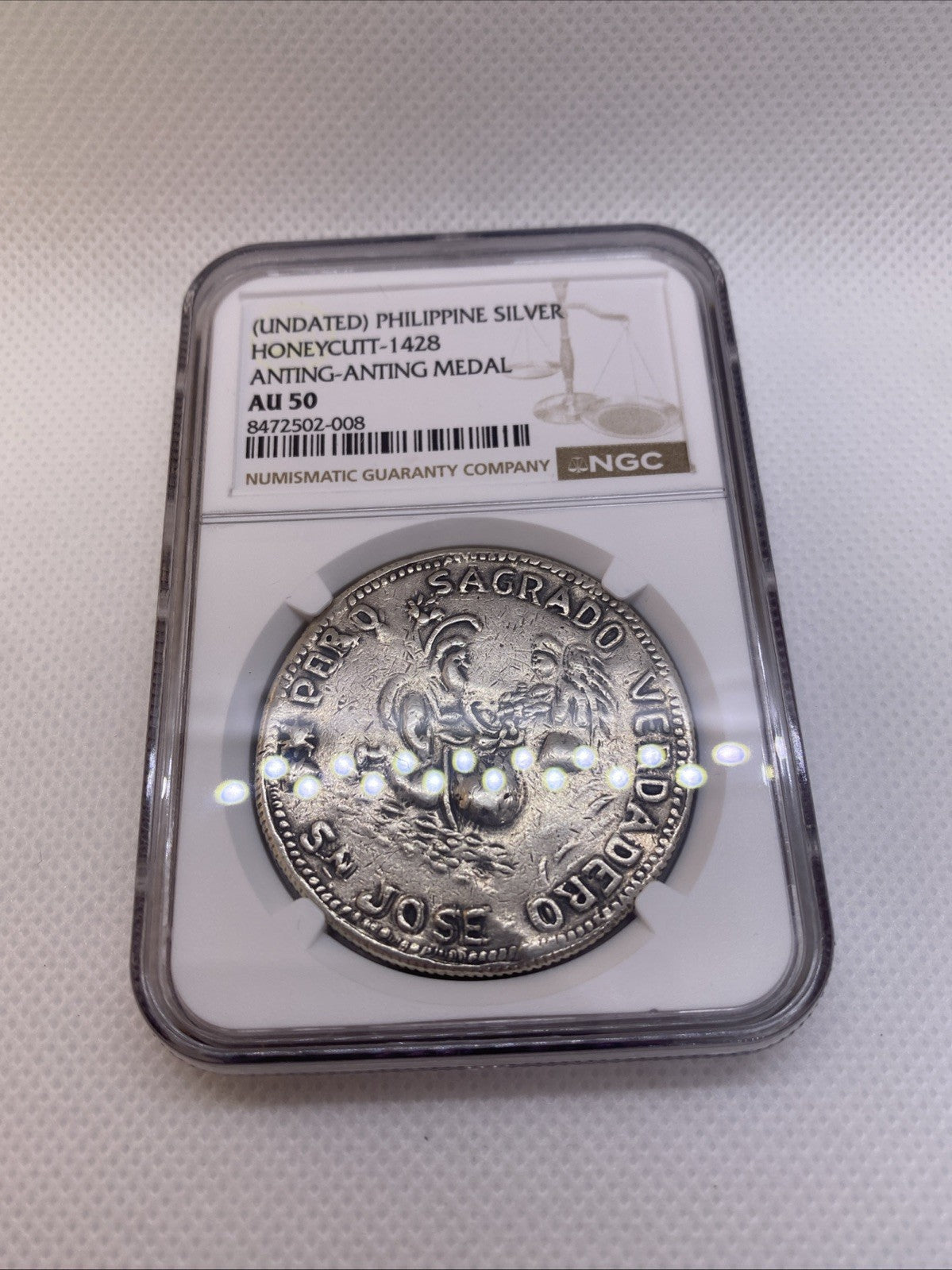 Philipines Honeycutt - 1428 Anting-Anting Silver Medal Graded NGC AU50 RARE
