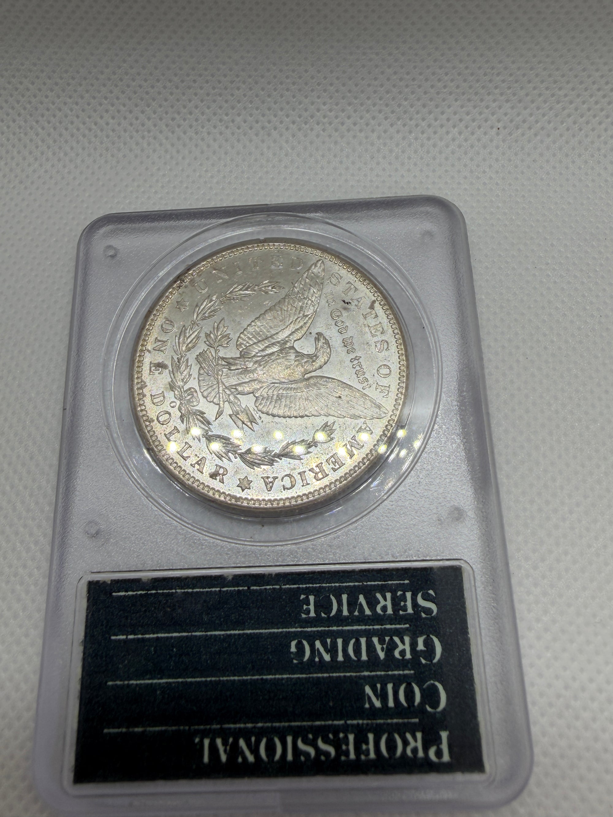 1904 O Morgan Silver Dollar – PCGS MS63 | Old Rattler Holder