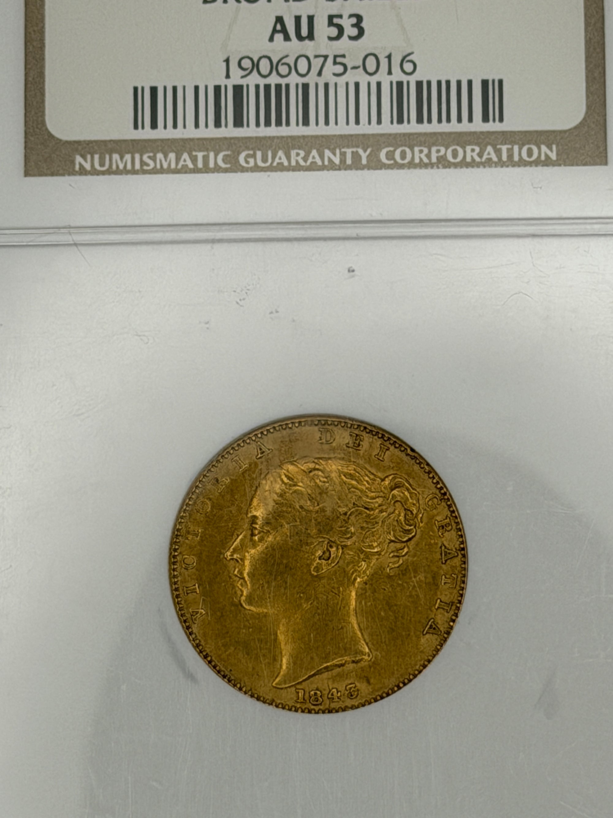 1843 Great Britain Gold Sovereign Broad Shield NGC AU53 | Queen Victoria Young Head