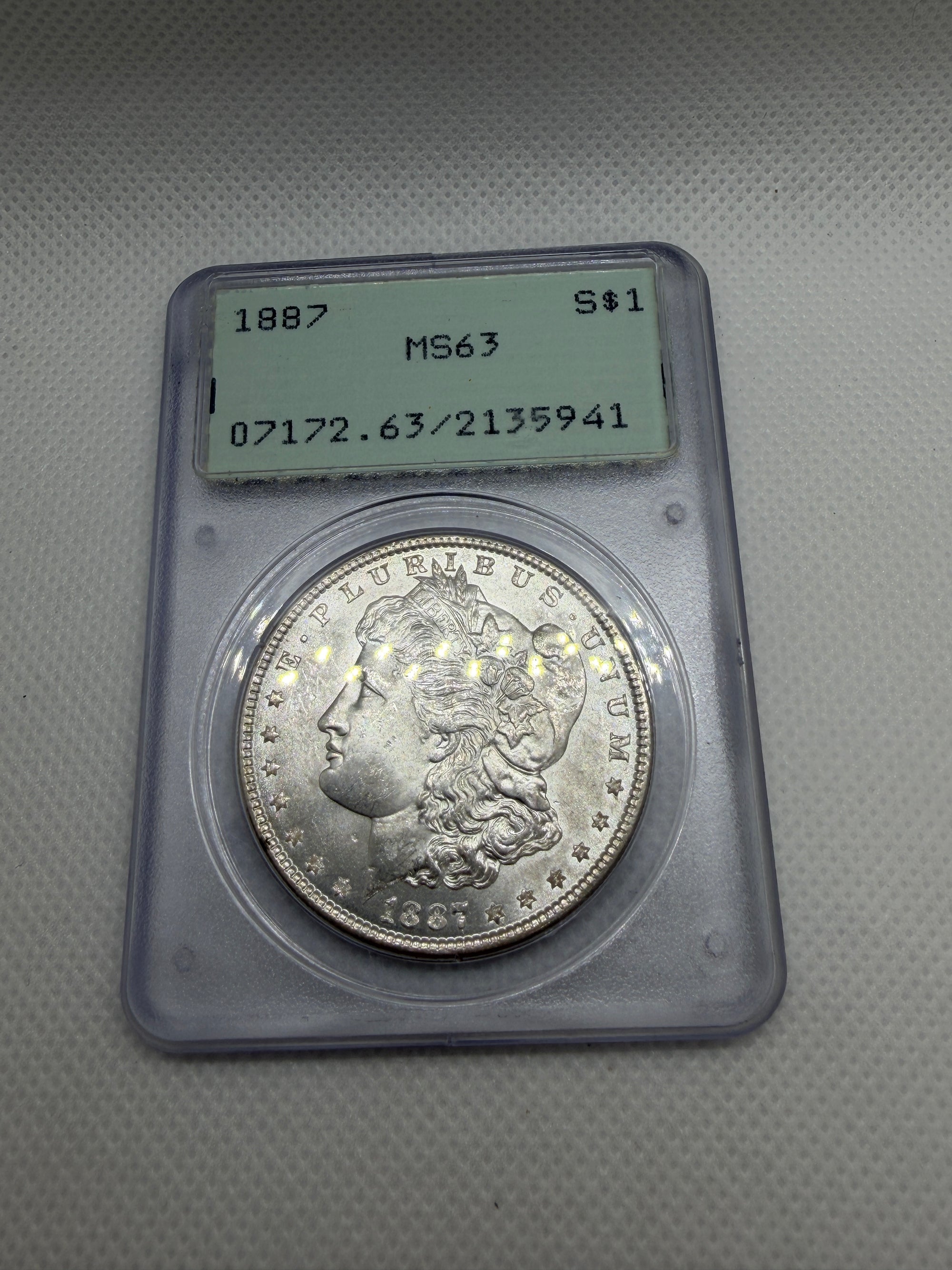1887 Morgan Silver Dollar – PCGS MS63 | Old Rattler Holder