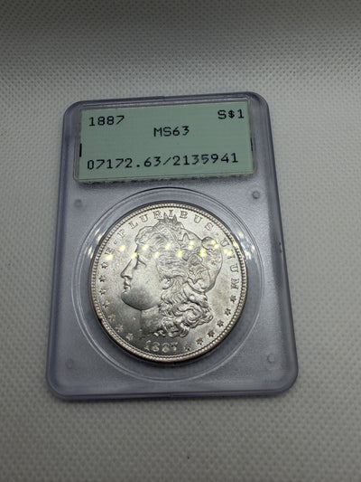 1887 Morgan Silver Dollar – PCGS MS63 | Old Rattler Holder