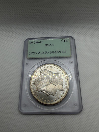 1904 O Morgan Silver Dollar – PCGS MS63 | Old Rattler Holder