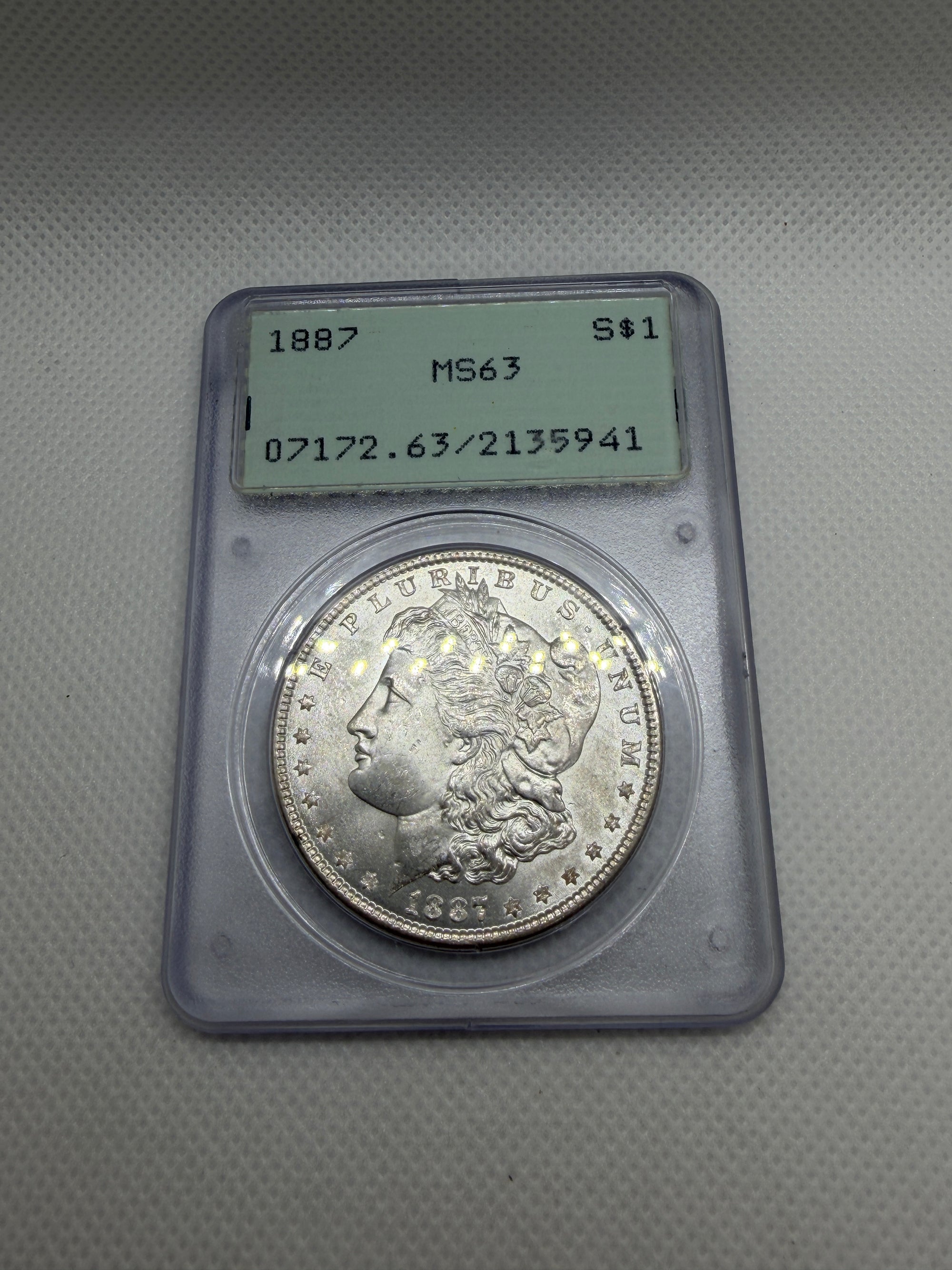 1887 Morgan Silver Dollar – PCGS MS63 | Old Rattler Holder