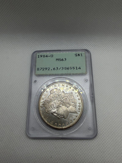 1904 O Morgan Silver Dollar – PCGS MS63 | Old Rattler Holder