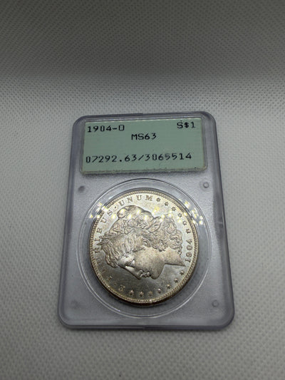 1904 O Morgan Silver Dollar – PCGS MS63 | Old Rattler Holder