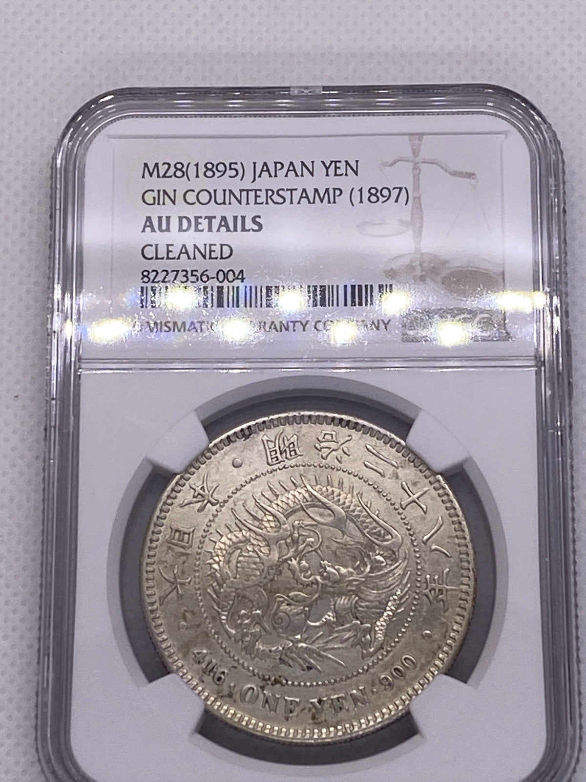 1895 (M28) Japan 1 Yen Silver Gin Counterstamp NGC AU Silver Coin RARE